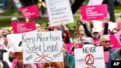 FILE - People rally in support of abortion rights at the state Capitol in Sacramento, Calif., May 21, 2019. 