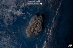 This image taken by Himawari-8, a Japanese weather satellite operated by Japan Meteorological Agency, shows an undersea volcano eruption near Tonga, Jan. 15, 2022.