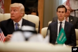 White House senior adviser Jared Kushner, right, looks on during a meeting between U.S. President Donald Trump, left, and leaders at the Gulf Cooperation Council Summit, at the King Abdulaziz Conference Center, in Riyadh, Saudi Arabia, May 21, 2017.