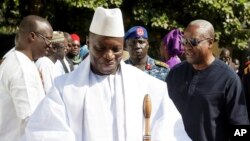 FILE - Yahya Jammeh, center, who has refused to step down as president of Gambia, is seen in Banjul, Gambia, Jan.13, 2017.
