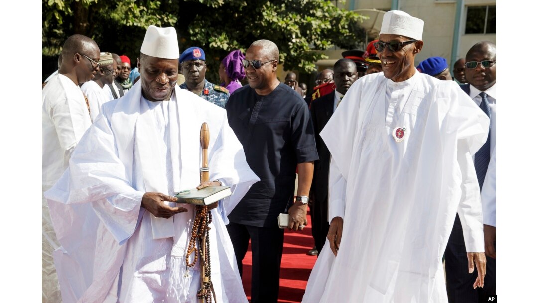 Yahya Jammeh, left, who has refused to step down as president of Gambia, is seen in Banjul, Jan.13, 2017.