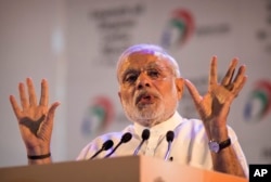 Indian Prime Minister Narendra Modi, addresses people during the launch of digital India project in New Delhi, India, July 1, 2015.