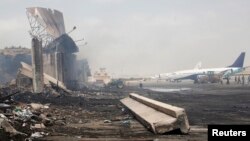 A damaged building at Jinnah International Airport, after attack by Taliban militants, Karachi, Pakistan. (June 10, 2014.) 