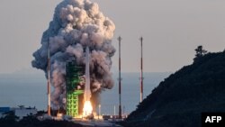 South Korea's first homegrown space rocket "Nuri" is launched at the Naro Space Centre in Goheung in South Jeolla Province, 473 kms south of Seoul on October 21, 2021. (Photo by YONHAP / AFP) 