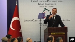Turkey's Prime Minister Recep Tayyip Erdogan addresses participants of the "Friends of Syria" conference in Istanbul April 1, 2012.
