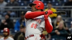 Cincinnati Reds' Yasiel Puig bats in the third inning of a game against the Pirates in Pittsburgh, April 5, 2019. The former Cuban star has been playing in the major leagues in the United States since 2013.