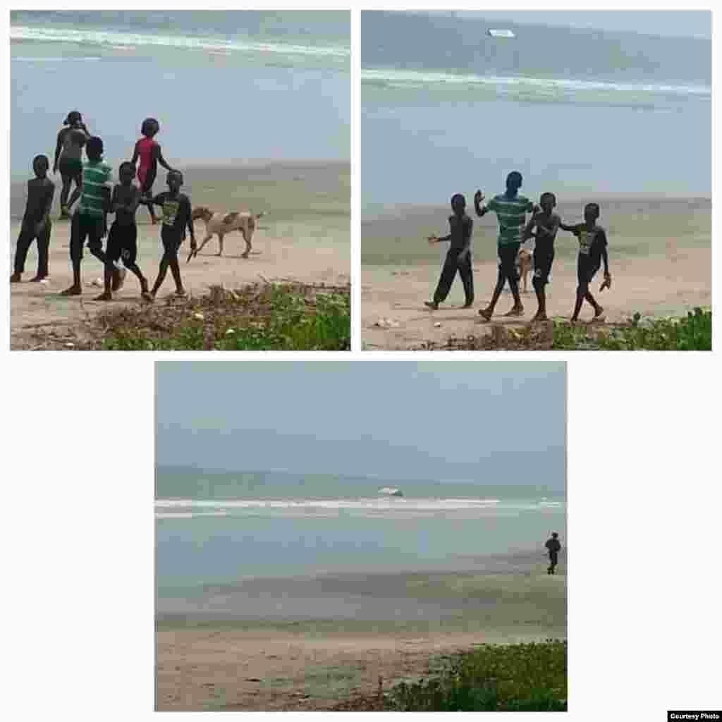 Angola, Cabinda - Crianças passeiam na praia, enquanto os contentores da MAERSK vão dando à costa. Um navio cargueiro afundou esta sexta-feira, 16, na costa de Cabinda. 2014