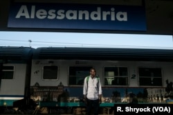 Every morning, Abdul Adan takes a 20-minute train ride to Alessandria, Italy, where he works with bee hives and in an organic garden to sell produce, Aug. 22, 2017. "I feel very lonely, very very," he says.