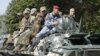 Ribuan Pejuang Ekstremis Kulit Putih Berangkat ke Ukraina 