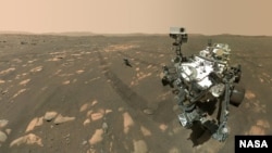 FILE - NASA’s Perseverance Mars rover took a 'selfie' with the Ingenuity helicopter on April 8, 2021, seen here about 13 feet (3.9 meters) from the rover. (Image Credit: NASA/JPL-Caltech/MSSS)
