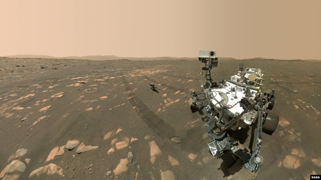 NASA’s Perseverance Mars rover took a 'selfie' with the Ingenuity helicopter, seen here about 13 feet (3.9 meters) from the rover. This image was taken by the WASTON camera on the rover’s robotic arm on April 6, 2021, the 46th Martian day, or sol, of the 