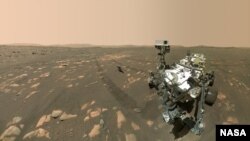 NASA’s Perseverance Mars rover took a 'selfie' with the Ingenuity helicopter, seen here about 13 feet (3.9 meters) from the rover. This image was taken by the WASTON camera on the rover’s robotic arm on April 6, 2021, the 46th Martian day, or sol, of the 