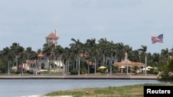 The Mar-a-Lago estate owned by U.S. President Donald Trump is shown with a U.S. flag in Palm Beach, Florida, April 5, 2017.