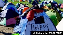 Migrants, in Greek Encampment, Await Permission for Next Step