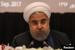 FILE - Iran's President Hassan Rouhani delivers remarks at a news conference during the United Nations General Assembly in New York City, Sept. 20, 2017.