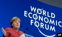 German Chancellor Angela Merkel addresses the annual meeting of the World Economic Forum in Davos, Switzerland, Jan. 23, 2019.