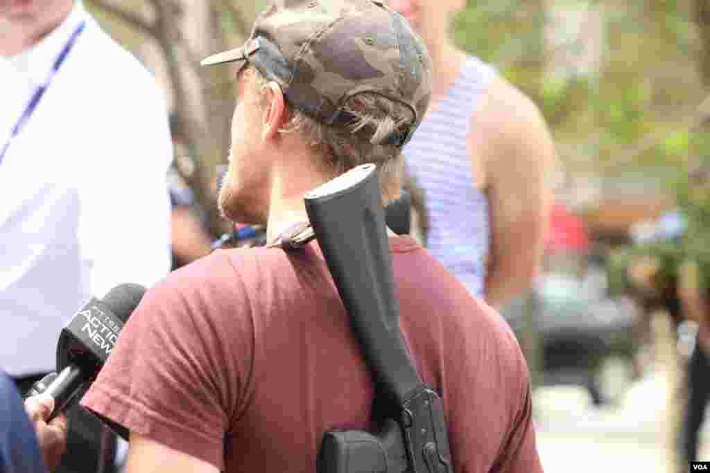 Protestor with gun in Cleveland, OH