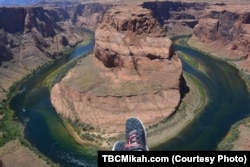 From the edge of a mesa above the Colorado River, it's easy to see how Horseshoe Bend got its name.