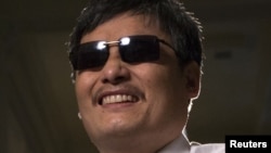 Blind Chinese activist Chen Guangcheng, who flew to the United States last week, said China's handling of the local officials who harassed and abused him and his family will determine whether the country can begin to achieve rule of law, May 24, 2012.