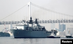 HMS Albion, the British Royal Navy flagship amphibious assault ship, arrives at Harumi Pier in Tokyo, Aug. 3, 2018.