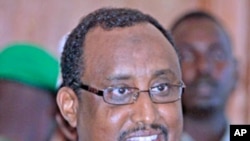 Somalia's Prime Minister Abdiweli Mohamed Ali addresses a news conference in the capital Mogadishu. Mohamed Ali was given the job full-time on Thursday by President Sheikh Sharif Ahmed and will form a government whose goal will be to quash a rebellion, Ju