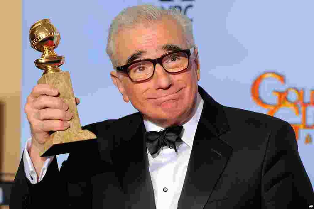 Director Martin Scorsese poses backstage with the award for Best Director of a Motion Picture for the film "Hugo" during the 69th Annual Golden Globe Awards January 15, 2012, in Los Angeles. (AP)