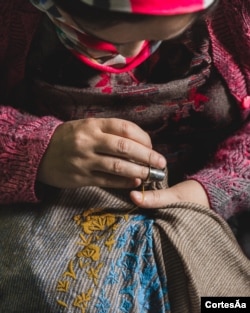 An artisan weaves the Pashmina fabric in Srinagar. (Me&K photo)