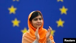 Pakistani teenage activist Malala Yousafzai, who was shot in the head by the Taliban for campaigning for girls' education, attends an award ceremony to receive her 2013 Sakharov Prize, at the European Parliament in Strasbourg, Nov. 20, 2013.