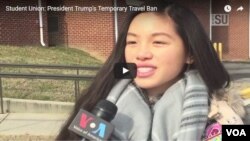 student ponder travel ban snip