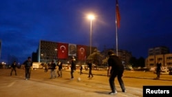 Anti-government protesters play soccer at Taksim Square in Istanbul, June 13, 2013.