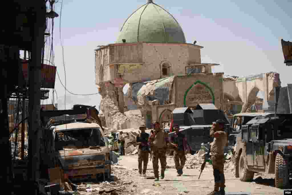 Soldiers in Old Mosul say in recent days at least 40 suicide bombers disguised as refugees have exploded themselves as they approached Iraqi forces. Most have only killed themselves, but soldiers and civilians have been killed and maimed. Mosul, Iraq, Jul