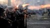 Pasukan keamanan menembakkan peluncur gas air mata saat bentrokan dengan pengunjuk rasa mahasiswa di Bandung, Jawa Barat, Rabu, 7 Oktober 2020.