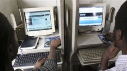 Nigerians use the internet at a cybercafe in Lagos, Nigeria