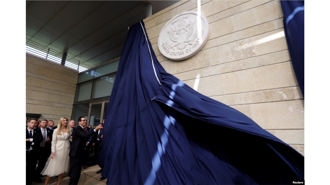 U.S. Treasury Secretary Steven Mnuchin unveils the seal for the new U.S. embassy during the dedication ceremony of the new U.S. embassy in Jerusalem, May 14, 2018.