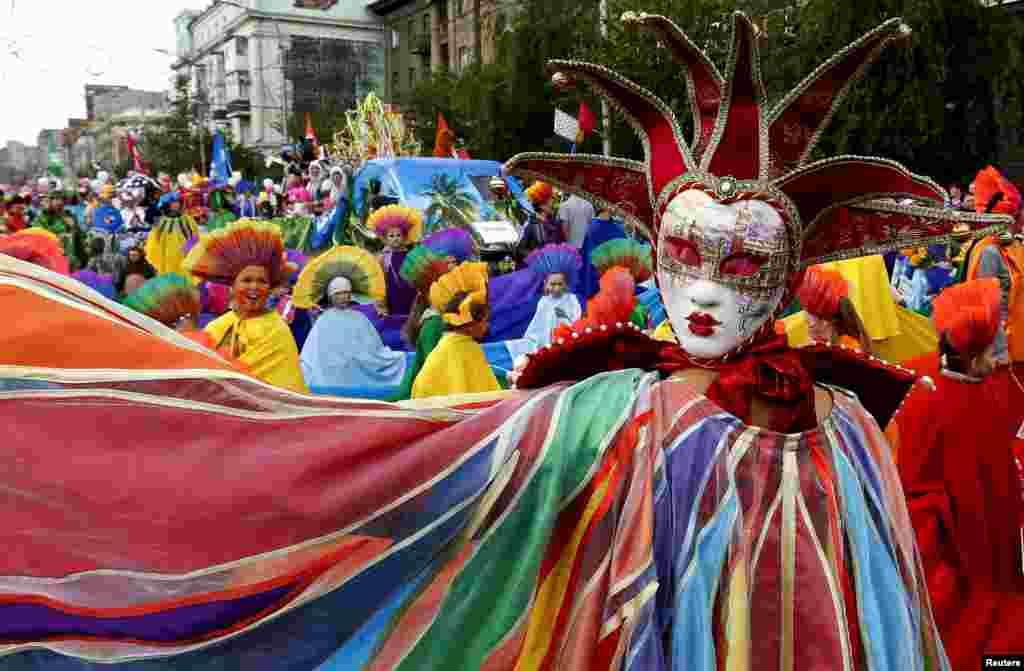 People take part in the &quot;City of Future&quot; carnival in central Krasnoyarsk, Siberia, Russia.