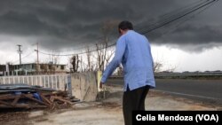 Habitantes de Puerto Rico tratan de volver a la normalidad tras el paso del huracán María