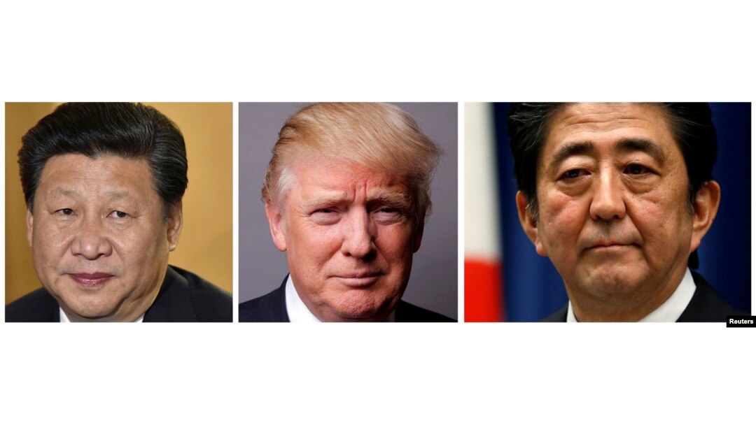 FILE - A combination of photos of U.S. President Donald Trump (center) in Washington, March 1, 2017, Japan's Prime Minister Shinzo Abe (right) in Tokyo, Nov. 18, 2014, and Chinese President Xi Jinping (left) at London's Heathrow Airport, Oct. 19, 2015.