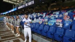 Cheerleaders encourage on the Stadium stands with no audience at Xinzhuang Baseball Stadium in New Taipei City, Taiwan, Friday, April 24, 2020. Taiwan's five-team Chinese Professional Baseball League is barring spectators over concerns they would spread t