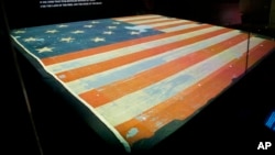 The Smithsonian's National Museum of American History exhibit of the flag that inspired the national anthem 'Star-Spangled Banner', Sept. 5, 2014, in Washington, D.C.