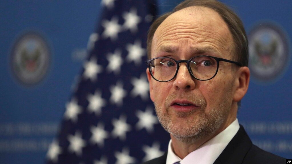 FILE - In this file photo taken on Nov. 9, 2016, U.S. Ambassador to Iraq Douglas Silliman speaks to the press during a gathering to watch U.S. election results in Baghdad. 