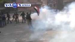 Anti-Morsi protesters in Cairo clash with security forces near Tahrir Square.