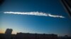 In this photo provided by Chelyabinsk.ru, a meteorite trail is seen over Chelyabinsk, February 15, 2013. 