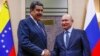 Tổng thống Nga Vladimir Putin bắt tay Tổng thống Venezuela Nicolas Maduro tại cuộc họp ở tư dinh Novo-Ogaryovo của Tổng thống bên ngoài Moscow, ngày 5/12/2018.