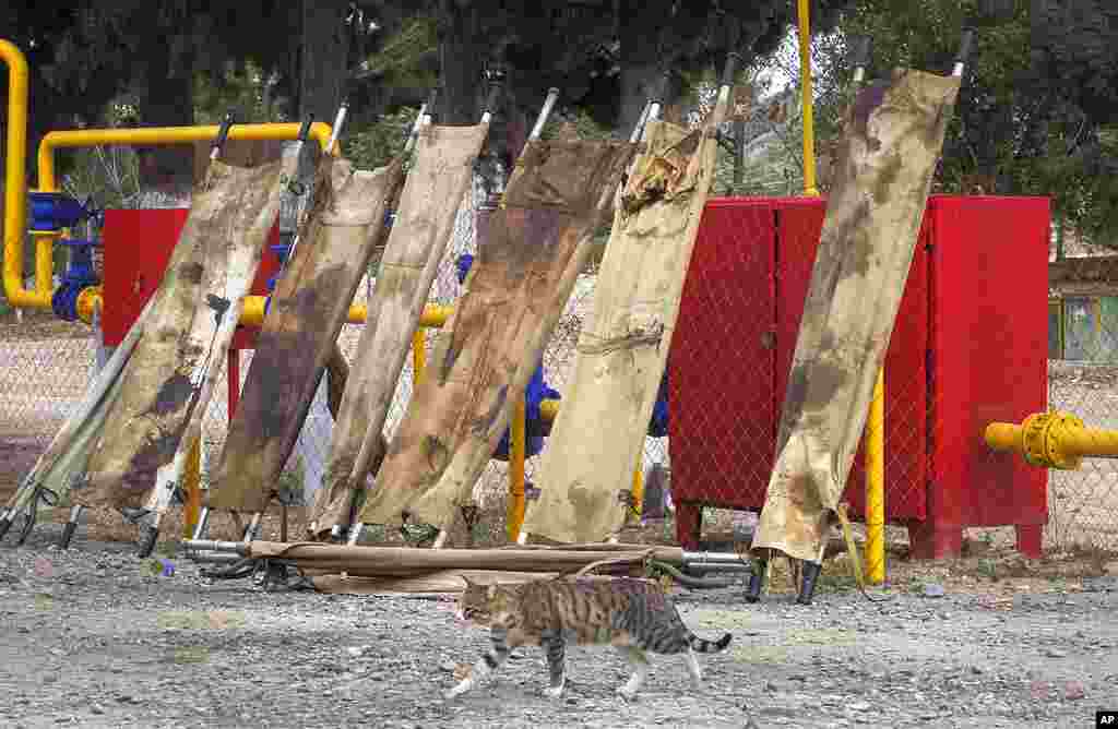 Blood-stained stretchers are dried in the yard of a military hospital near the frontline in the separatist region of Nagorno-Karabakh.