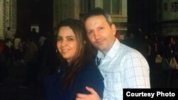 Iranian doctor Ahmad Reza Jalali and wife Vida Mehran Nia in Florence, Italy, Oct. 28, 2014. Jalali, detained in Iran since April 2016 and sentenced to death for collaborating with a hostile power, was granted Swedish citizenship in February 2018.