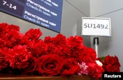 A view shows flowers, which were placed in memory of victims of an incident involving an Aeroflot Sukhoi Superjet 100 passenger plane, at Moscow's Sheremetyevo airport, Russia, May 6, 2019.