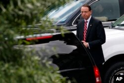 Deputy Attorney General Rod Rosenstein leaves a meeting at the White House in Washington, May 21, 2018.