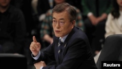 Moon Jae-in, the presidential candidate of the Democratic Party of Korea, speaks during a televised debate in Goyang, South Korea, April 25, 2017.
