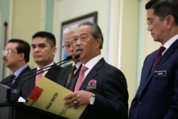 Perdana Menteri Malaysia Muhyiddin Yassin dalam konferensi pers di Putrajaya, Malaysia 11 Maret 2020. (REUTERS/Lim Huey Teng/File Photo)