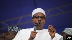 Muhammadu Buhari, former military ruler and presidential candidate for the Congress for Progressive Change (CPC), speaks during the flag-off of the presidential campaign at Mapo square, Ibadan, south-west Nigeria, March 14, 2011.